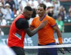epa09832734 Rafael Nadal of Spain (R) greets Nick Kyrgios of Australia at the net after their match during the BNP Paribas Open tennis tournament at the Indian Wells Tennis Garden in Indian Wells, California, USA, 17 March 2022. Nadal defeated Kyrgios in two tie-break sets, 7-6 (0), 6-4. EPA/JOHN G MABANGLO